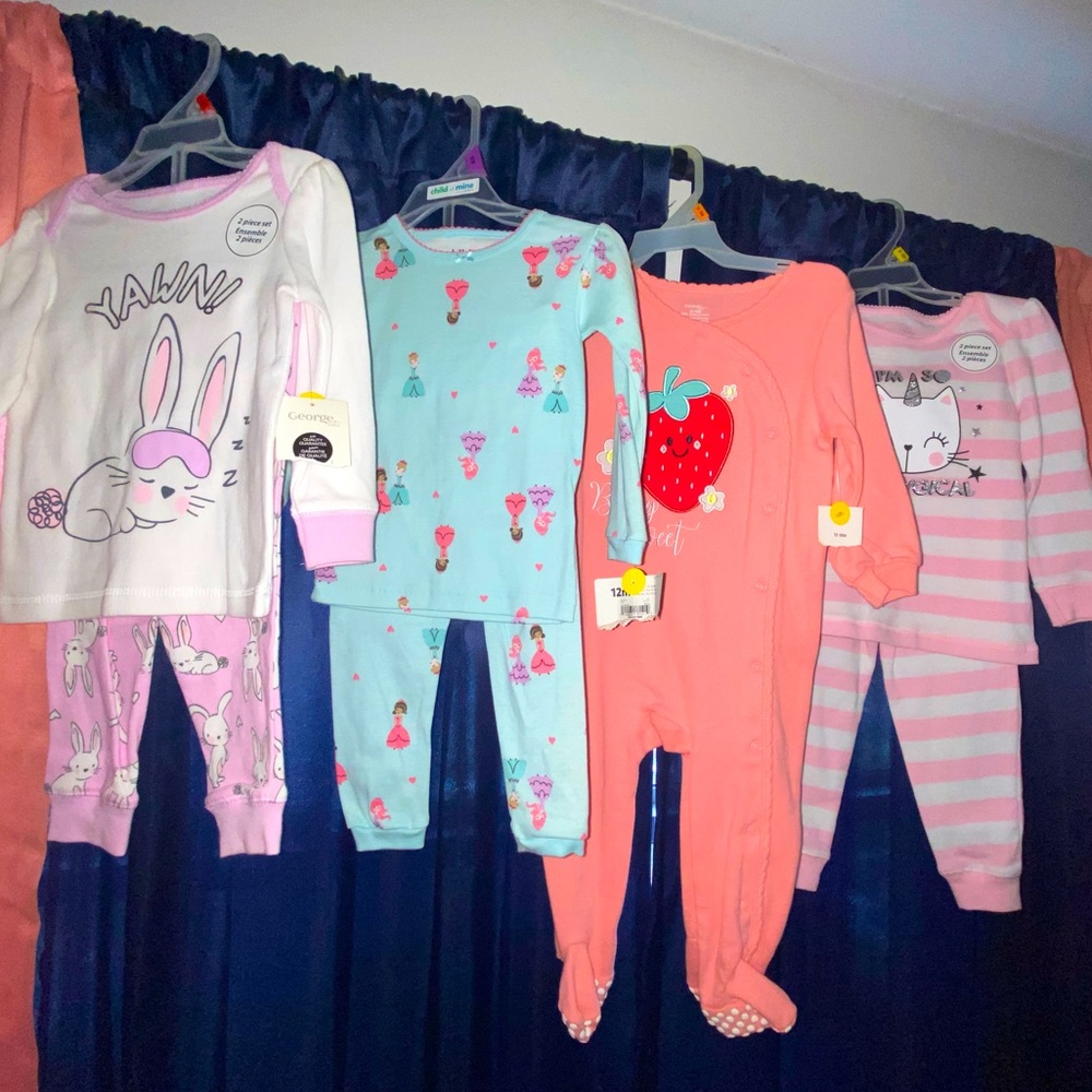 Set of baby girl pj’s.  Different sizes.  A way